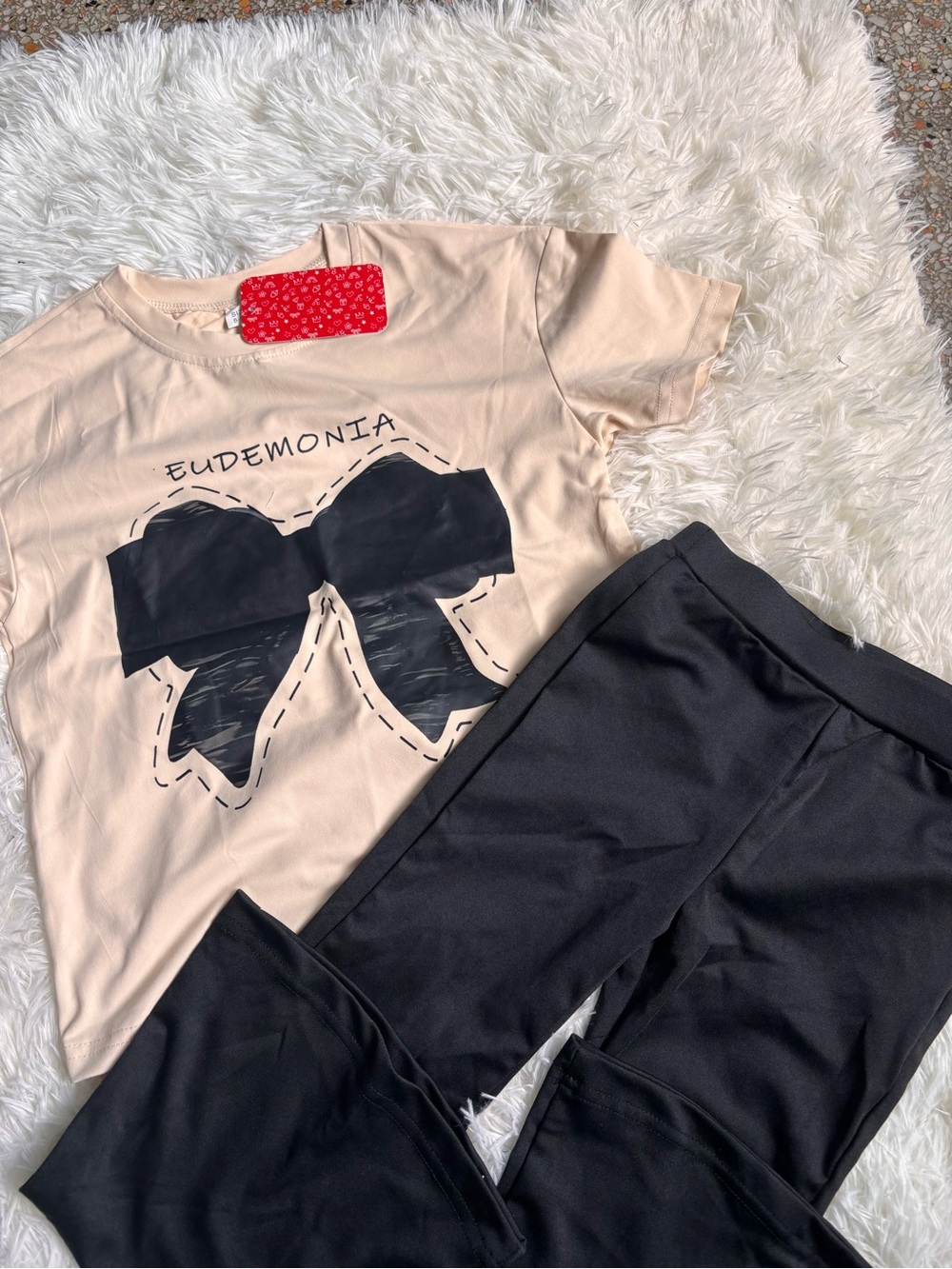 Demonia Cream Tee with Black Bow Graphic
